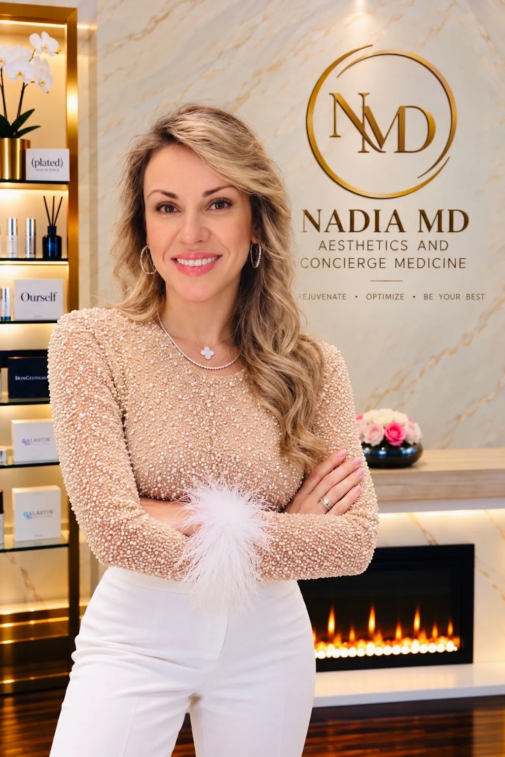 Dr. Nadia Stoilova, arms crossed, in front of the Nadia MD sign at the clinic